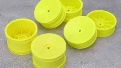 株式会社ジーフォース　1/10バギー用イエローディッシュホイール発売のお知らせを掲載